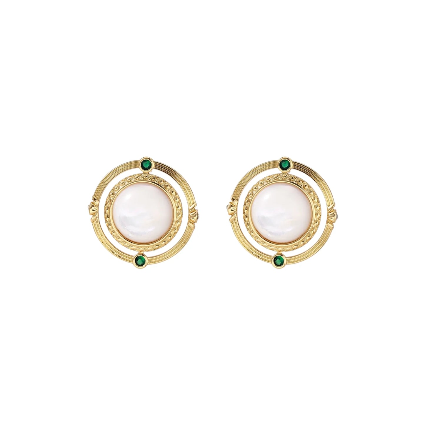 Circular gold stud earrings with iridescent mother-of-pearl center and green zirconia accents on cream background.