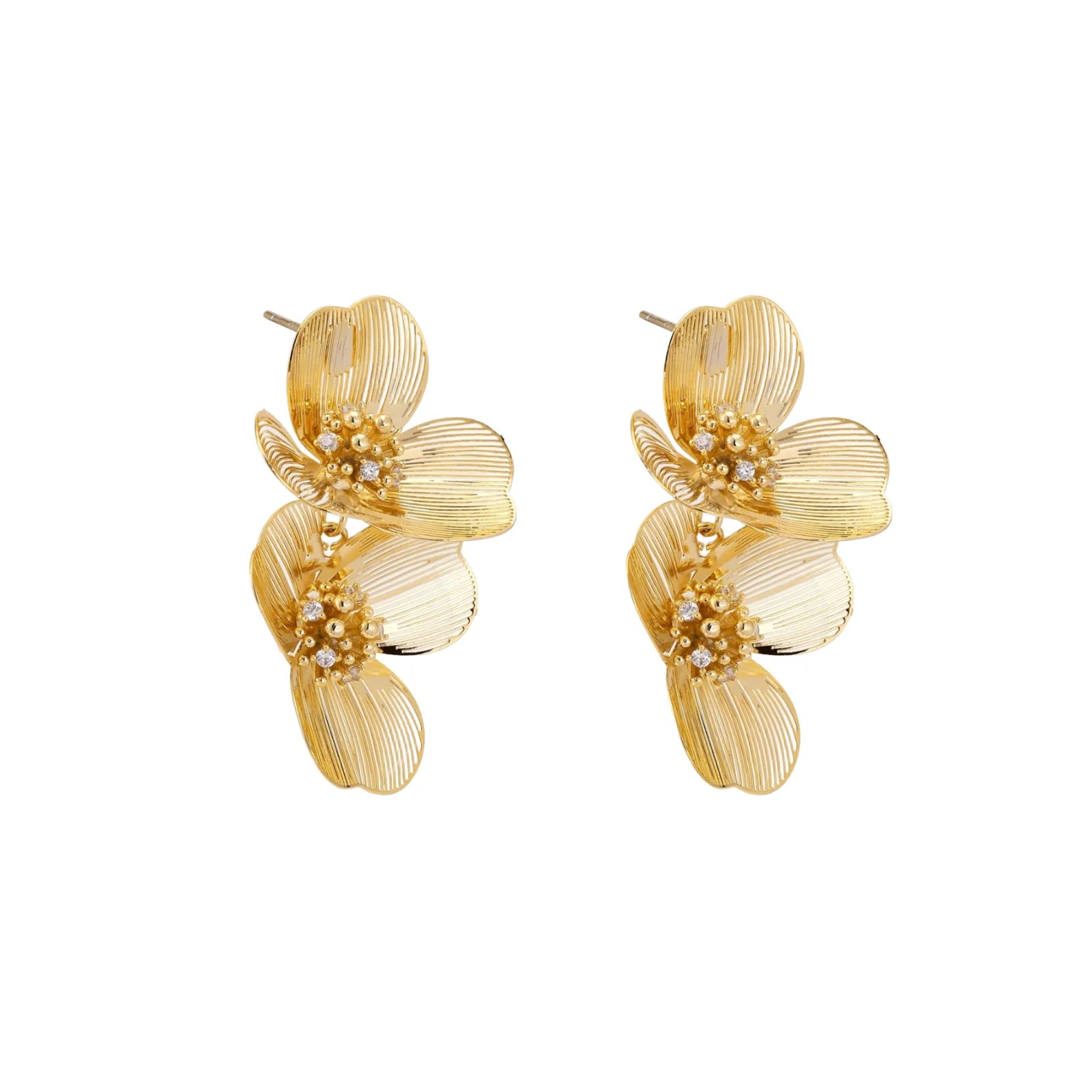 Pair of gold-plated double flower earrings with textured petals and crystal centers on cream background.