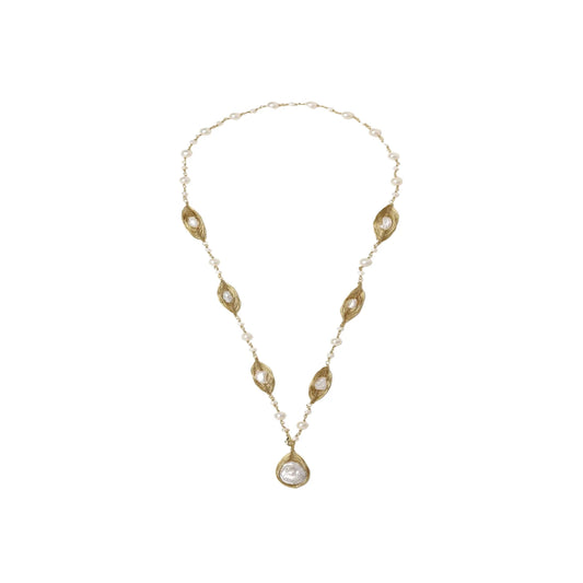 14K gold-plated necklace with eye-shaped stations and baroque pearl pendant on cream background