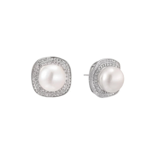 Cushion-shaped sterling silver stud earrings with freshwater pearls surrounded by geometric diamond halos