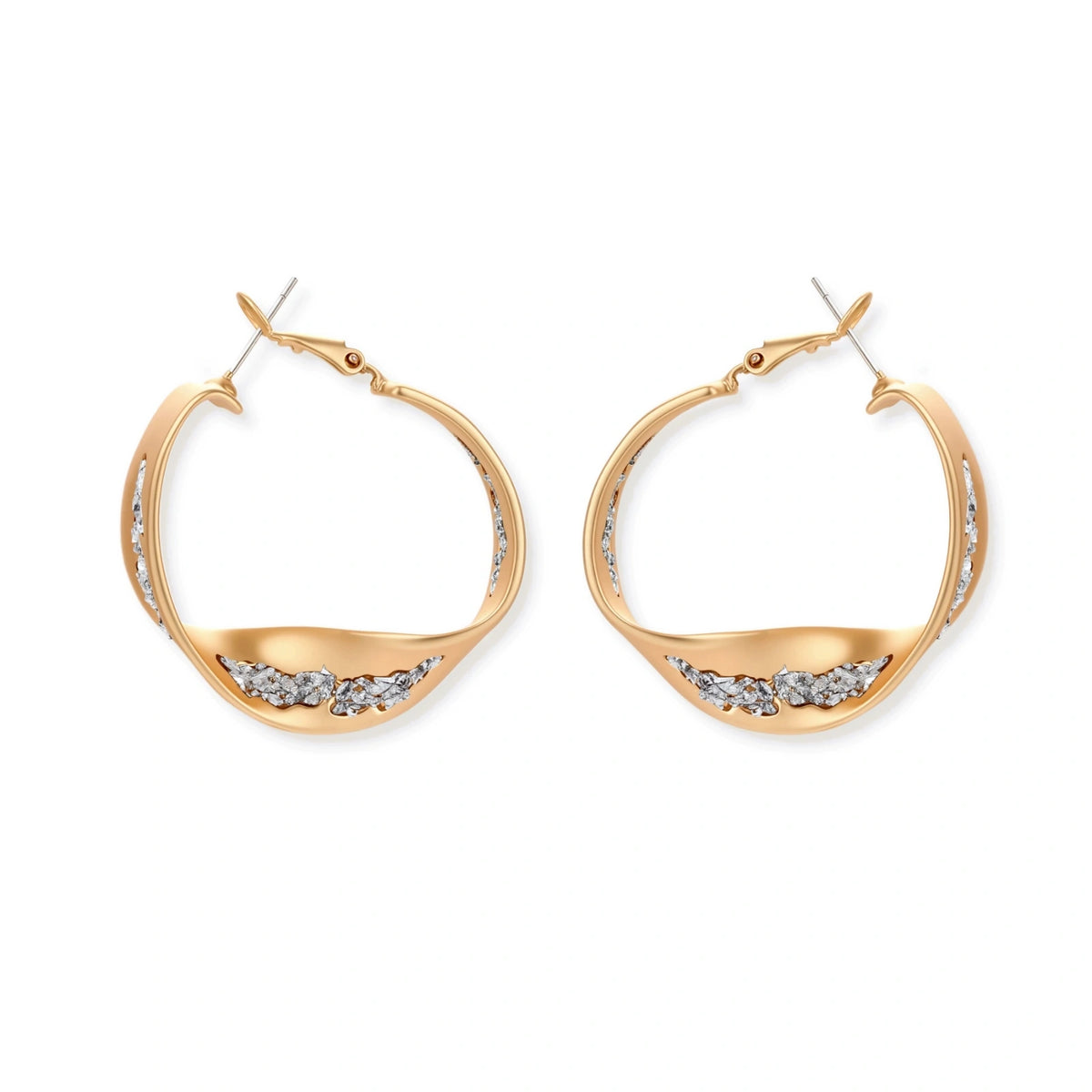 Organic-shaped gold hoop earrings with scattered crystals, featuring hinged closure on white background.