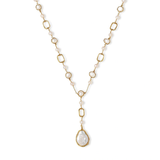 Long gold-plated necklace with alternating freshwater pearls and crystal bezels, featuring a large baroque pearl pendant